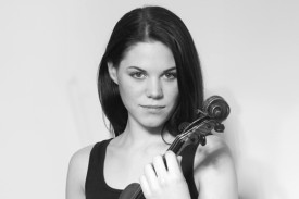 Headshot of Holly Nelson holding a violin